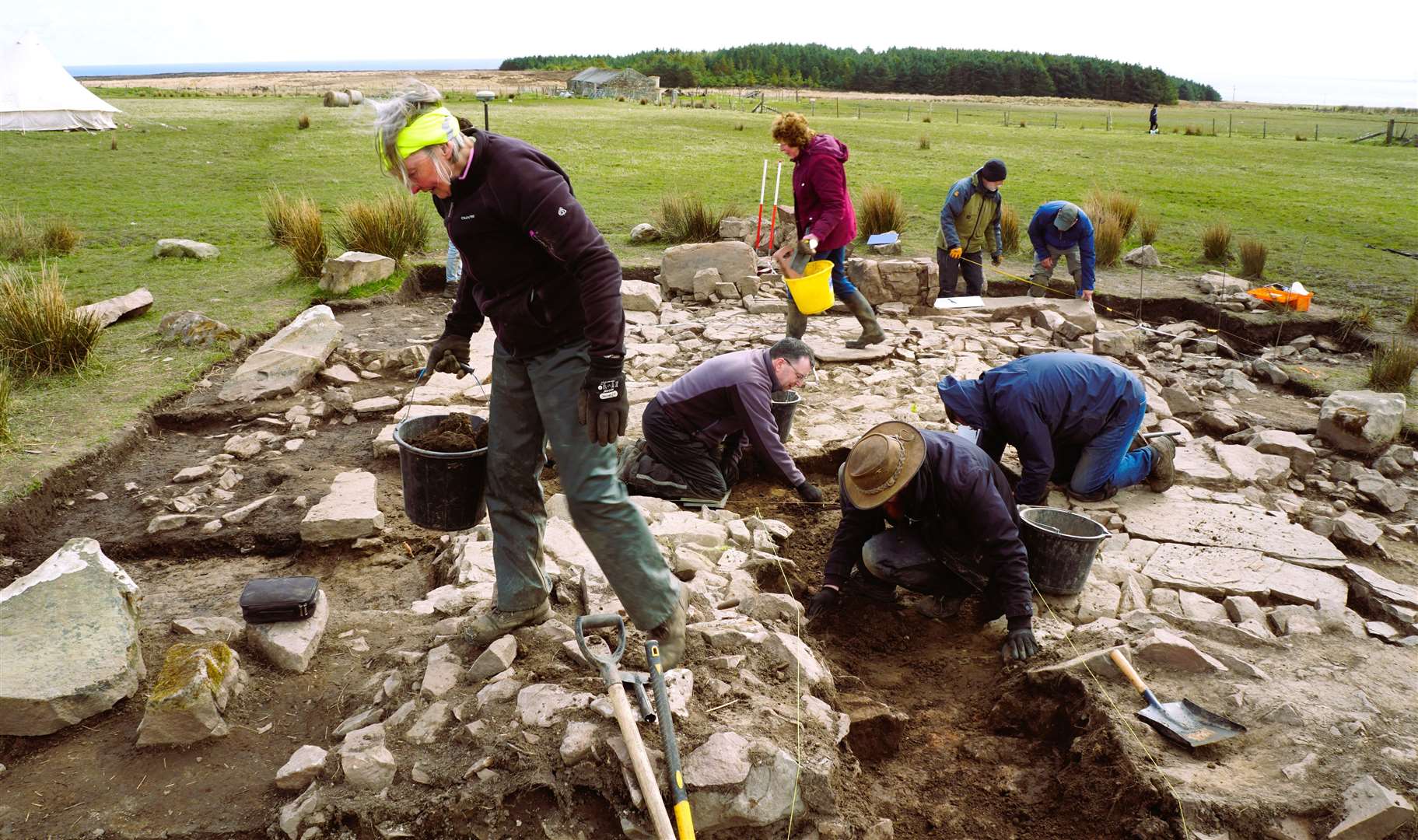 The mix of volunteers and seasoned archaeologists at work during the Open Day event. Picture: DGS
