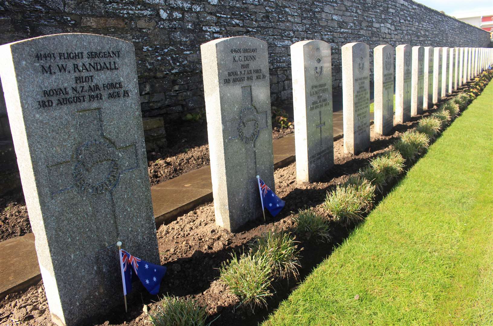 New Zealand graves with small flags placed beside them. Picture: Alan Hendry
