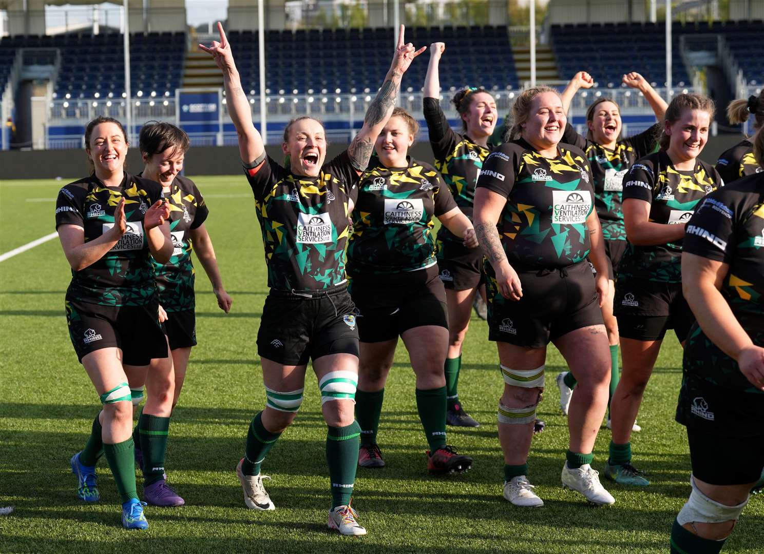 Helen Richard, one of the Krakens' most experienced campaigners, raises her arms in triumph as the Krakens leave the pitch. Picture: Scottish Rugby / SNS