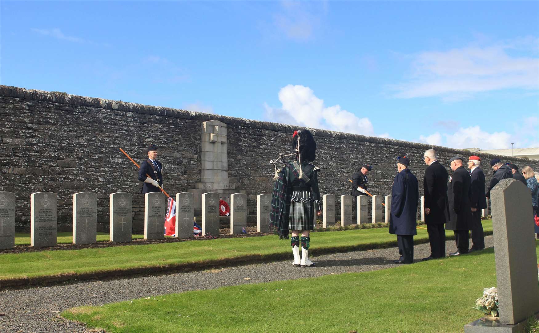 The two-minute silence being observed in Wick cemetery on Anzac Day. Picture: Alan Hendry