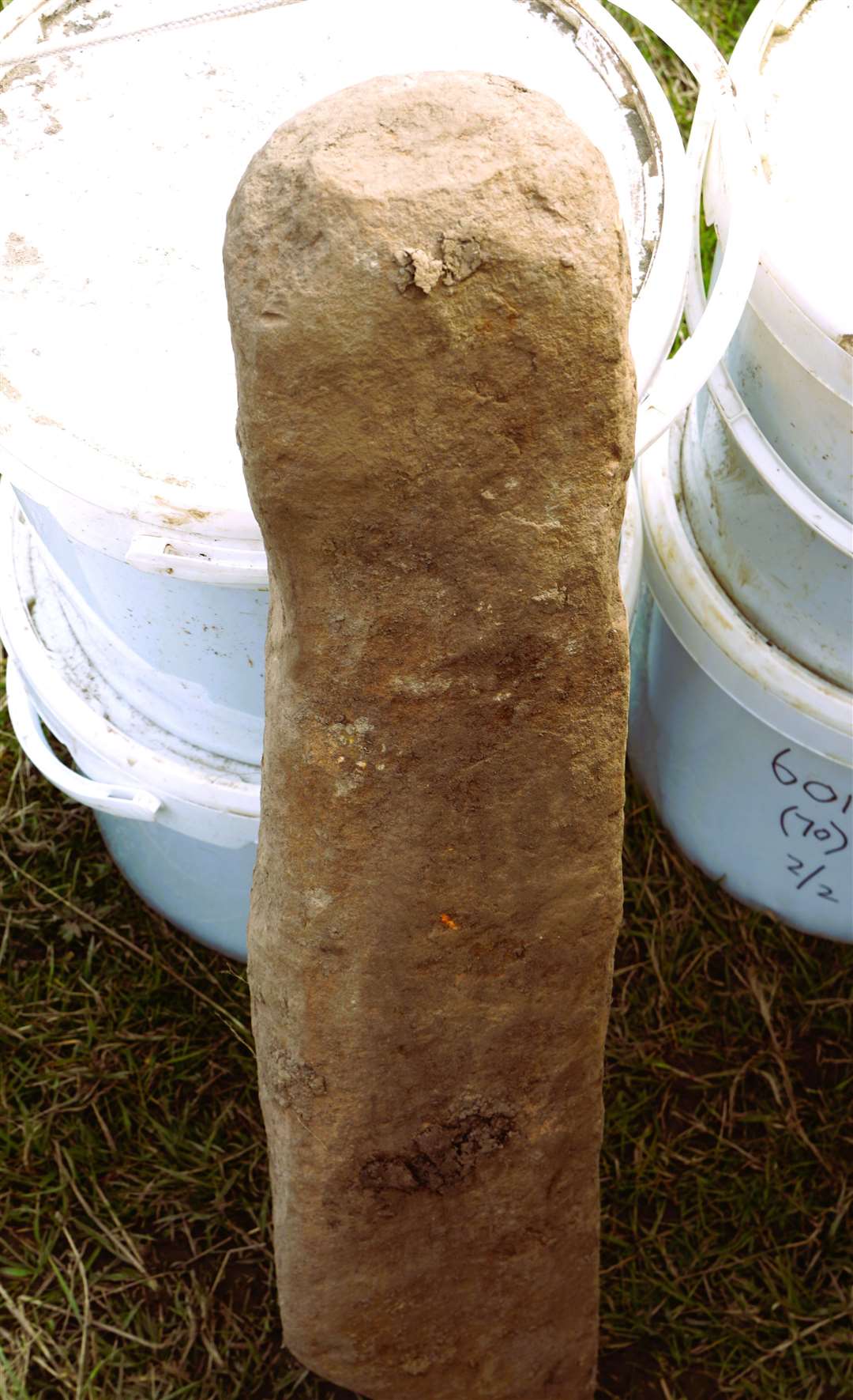 This stone post shows evidence that it would have stood upright and utilised as a tethering device, possibly for animals. Picture: DGS