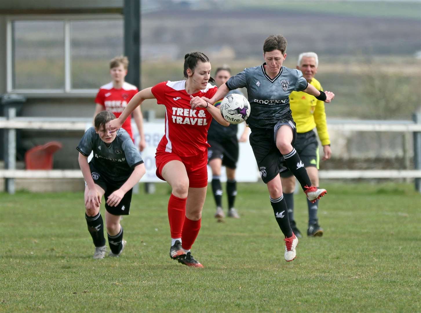 Orkney captain Amy Pickles battles with Hannah Hutson of Caithness Ladies. Picture: James Gunn