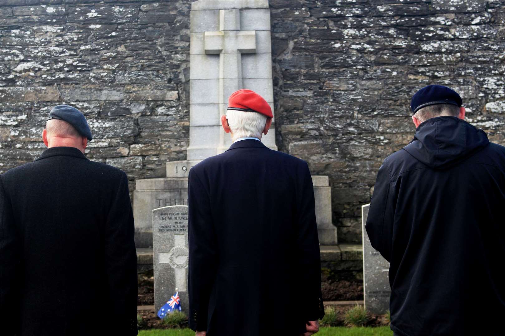 Denny Swanson (centre), a former military policeman, and two fellow Legion branch members at the Anzac Day event at Wick’s war graves. Picture: Alan Hendry