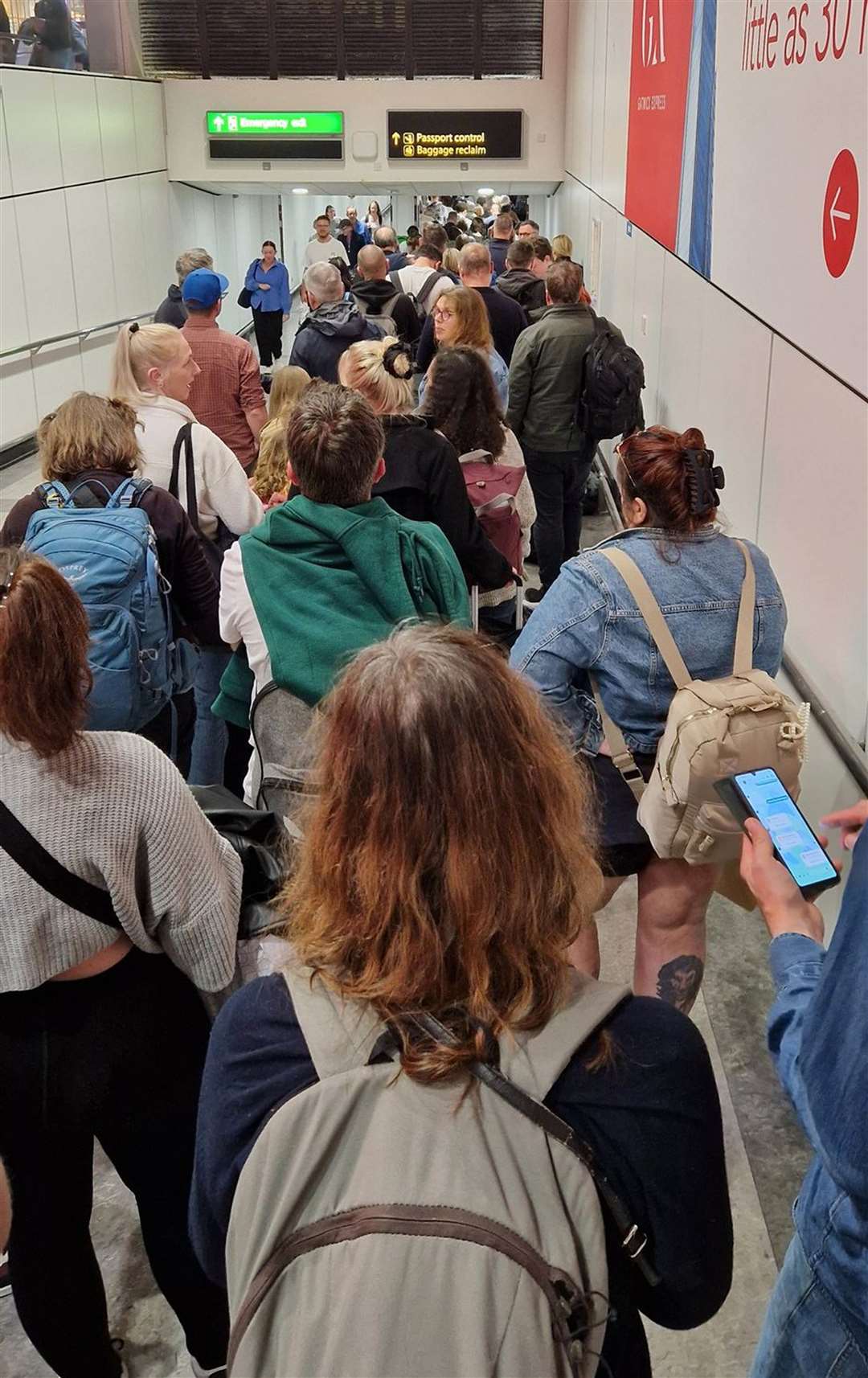 Long queues to go through passport checks at Gatwick Airport (Paul Uwagboe/PA)