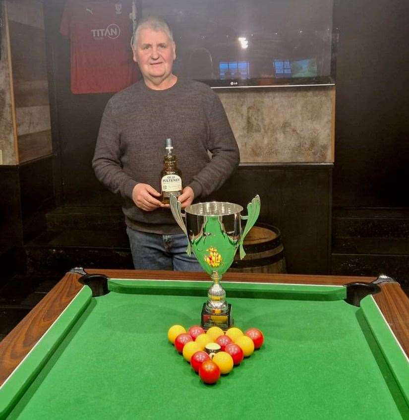 Long-serving pool player William Ronaldson, a member of the successful Village Inn team, was presented with a bottle of Old Pulteney.