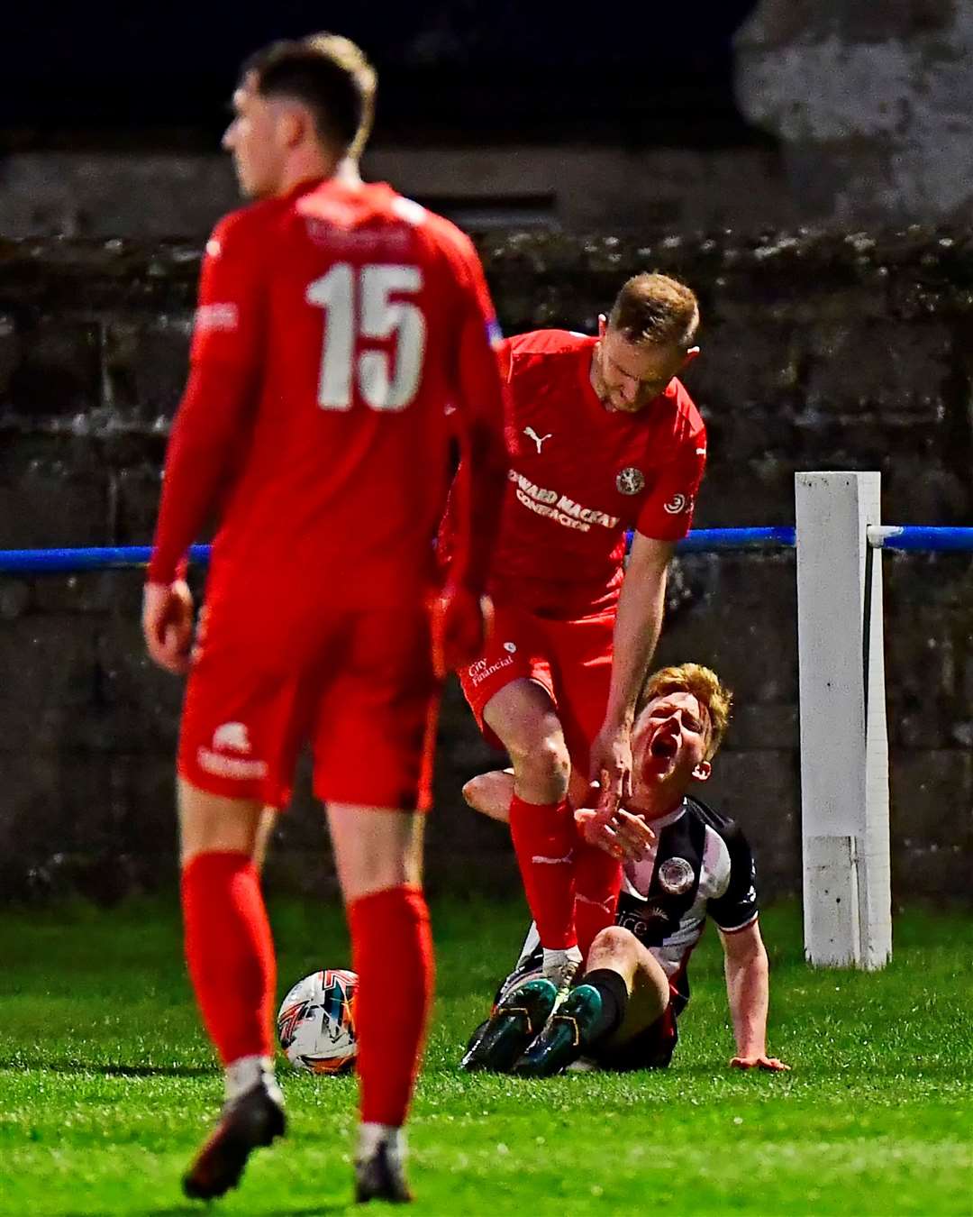A painful one for Ross Gunn as Brora Rangers' Mark Nicolson appears to stand on him during the match at King George V Park in Golspie. Picture: Mel Roger