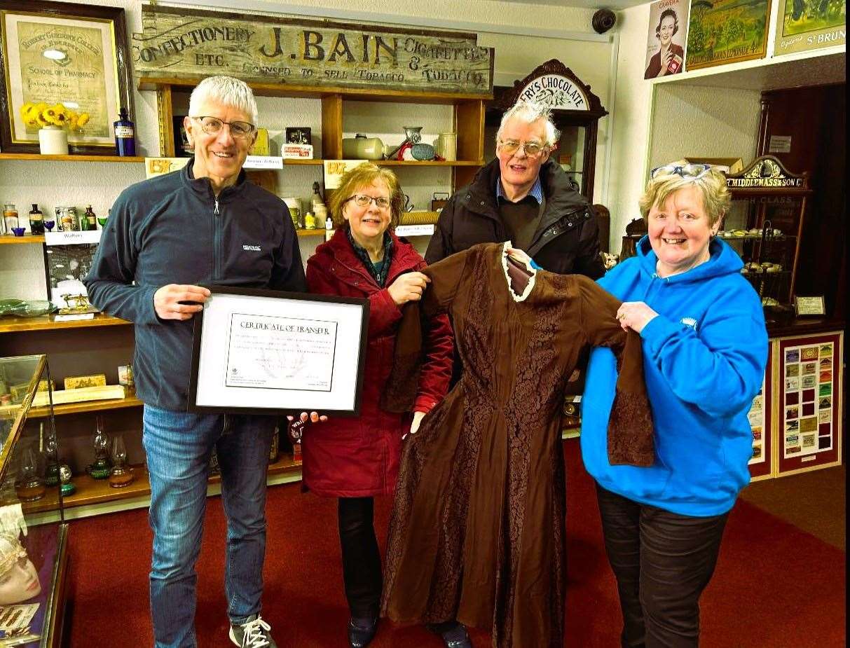 Handover of vintage clothing at Wick Heritage Museum. From left, Wick Society members Raymond Hill along with Elizabeth and Donald Henderson receive the clothing from Wick Players' chairperson, Jenny Szyfelbain. Picture supplied