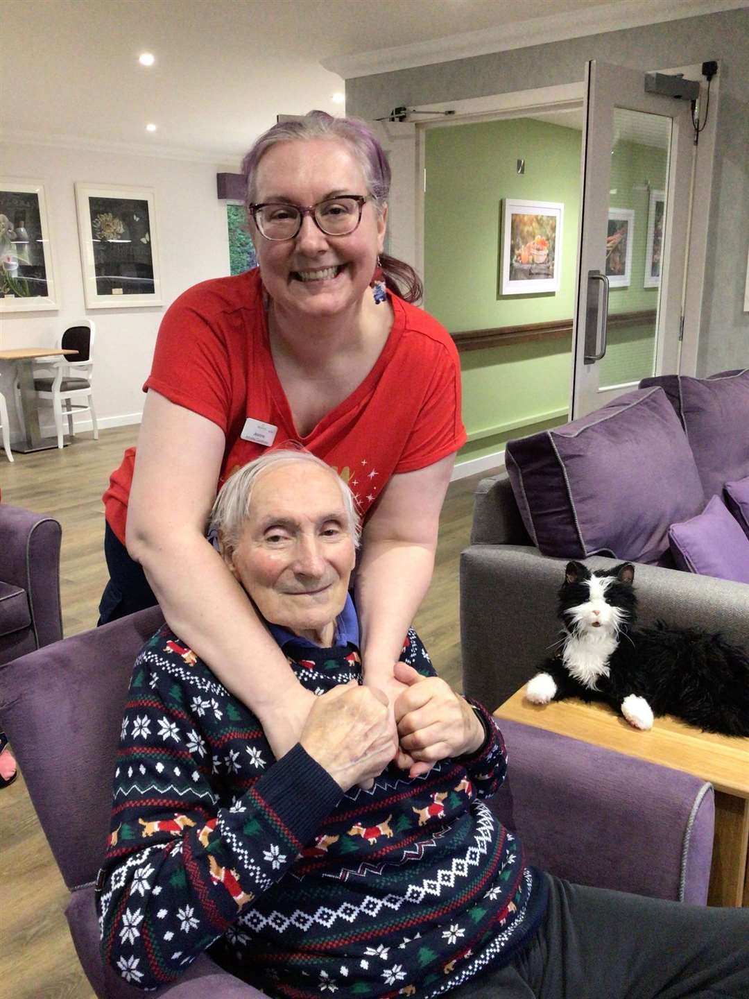 Don Calder, one of the residents of Pentland View who joined in on the festive fun for a good cause on Christmas Jumper Day, with staff member Jeanine Sinclair.
