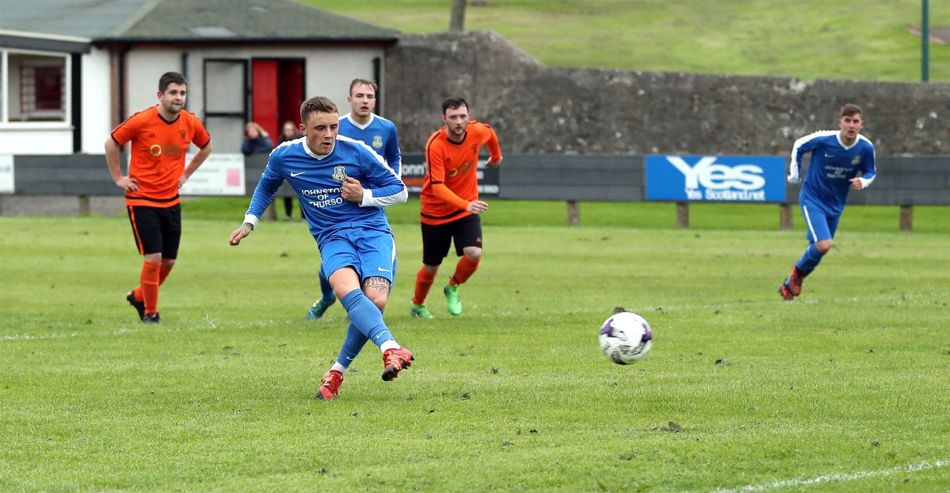 Thurso Acks' Louis Webster slots home a penalty to level during their 1-1 draw against John O'Groats. Picture: James Gunn