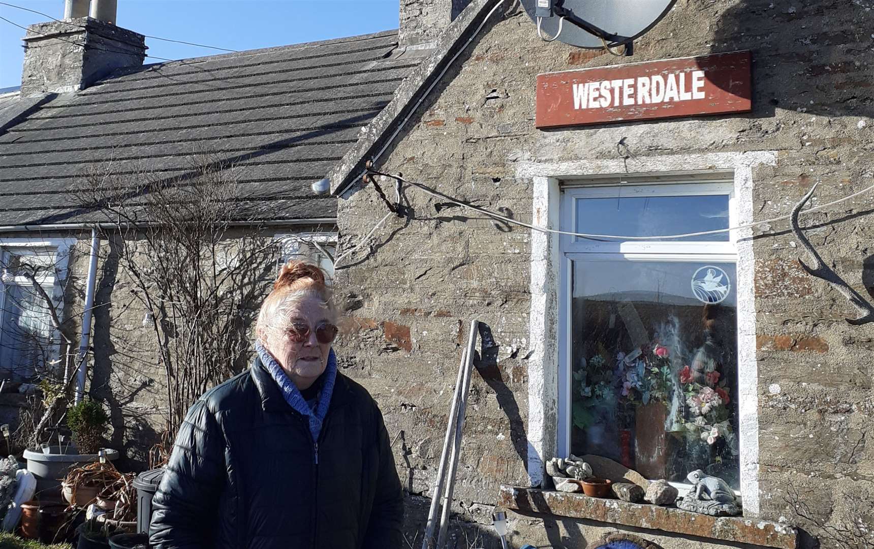 Barbara MacKay outside her home at Westerdale.