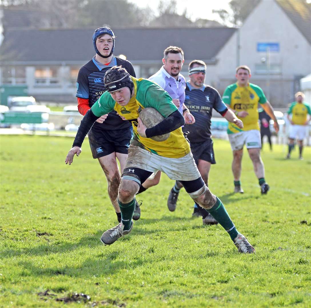 Duncan Mackay heads for the try line to score against Fraserburgh. Picture: James Gunn