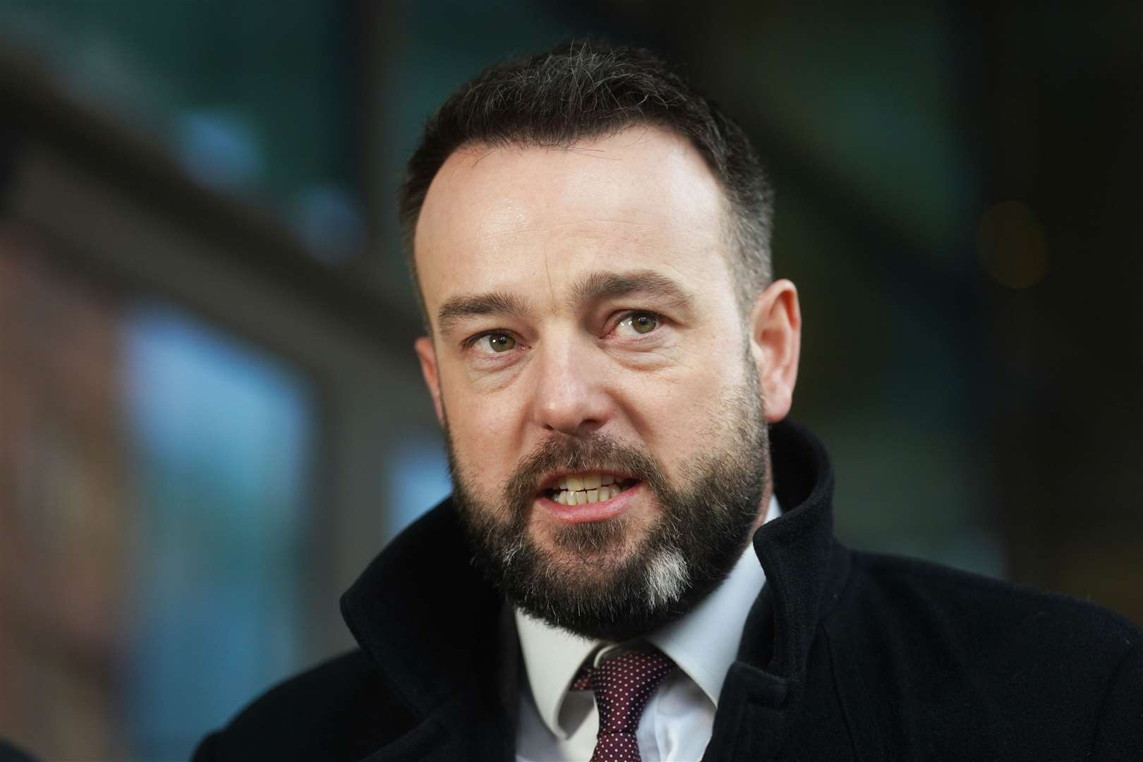 SDLP leader Colum Eastwood speaking to the media outside the Grand Central Hotel in Belfast following his meeting with Irish Foreign Affairs Minister and Tanaiste Micheal Martin. (Brian Lawless/PA)
