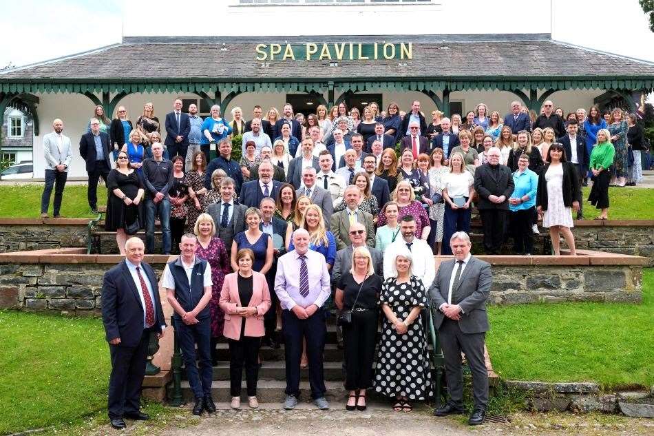 Jennifer with other attendees gathered outside on the steps of the Strathpeffer Pavilion at the end of the ceremony. Picture: HC