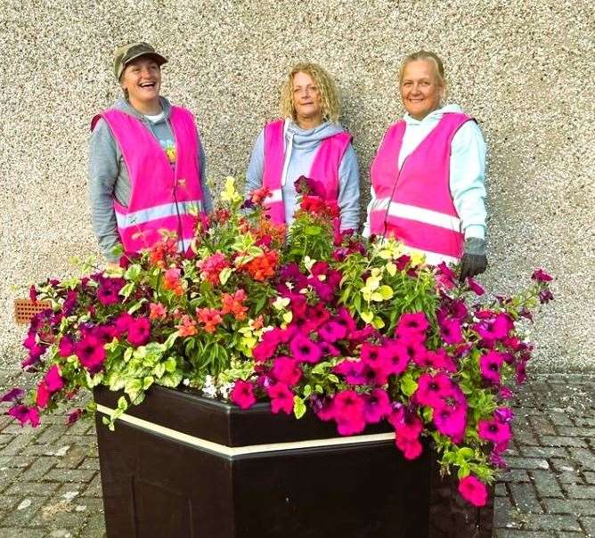 Flowers group members with new high visibility jackets.