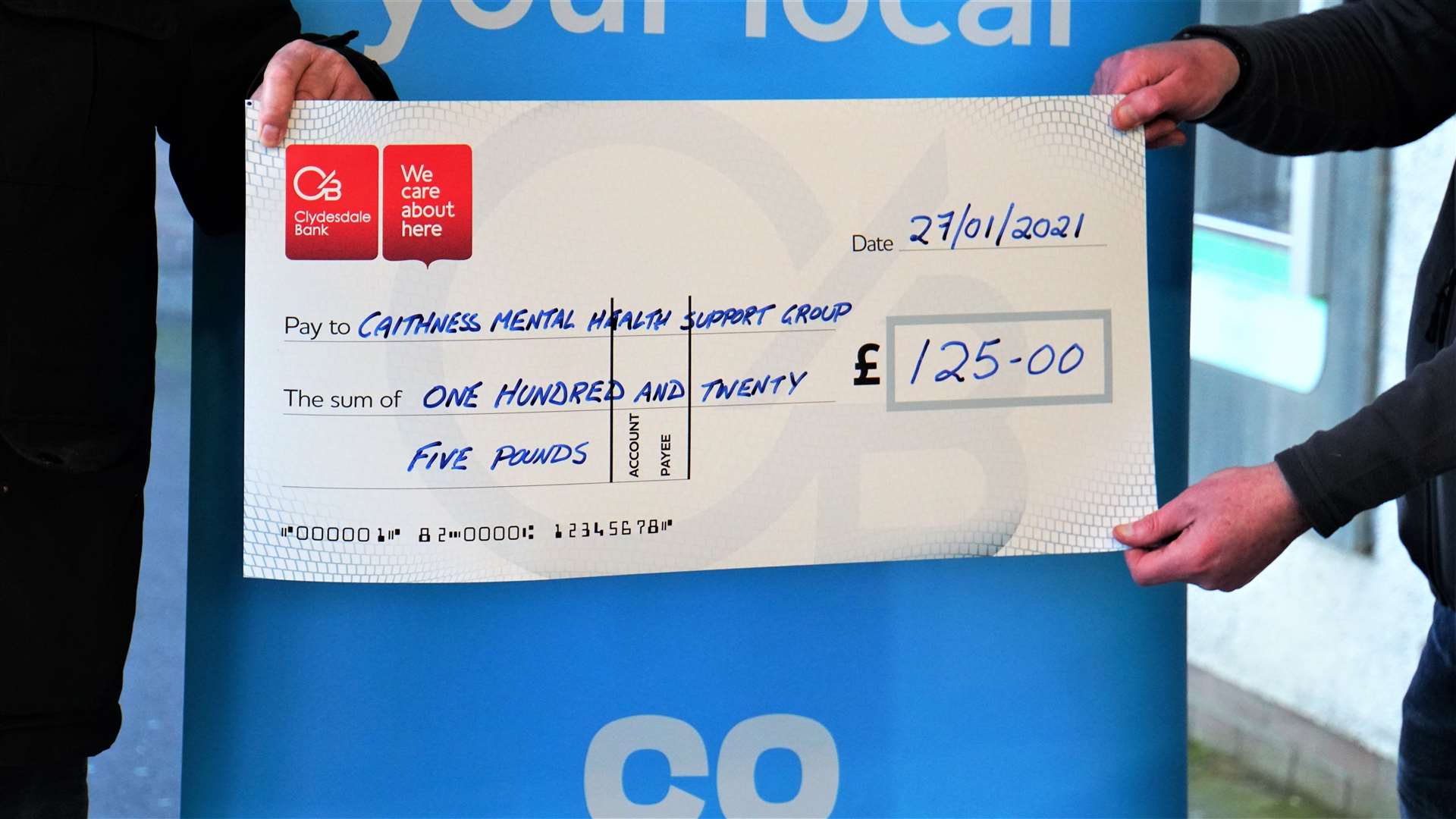The big cheque that was handed over to the local mental health charity. Picture: DGS