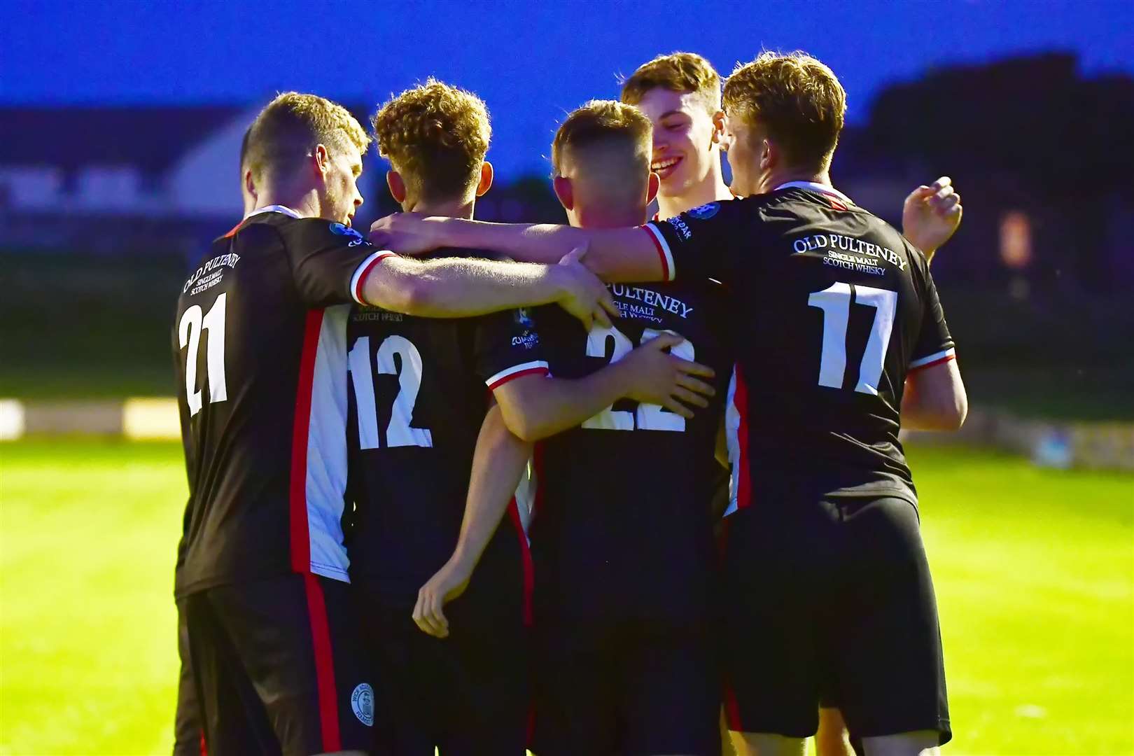 Wick Academy players celebrate with Harry Hennem after the ICT loan signing scored his first goal for the club. Picture: Mel Roger