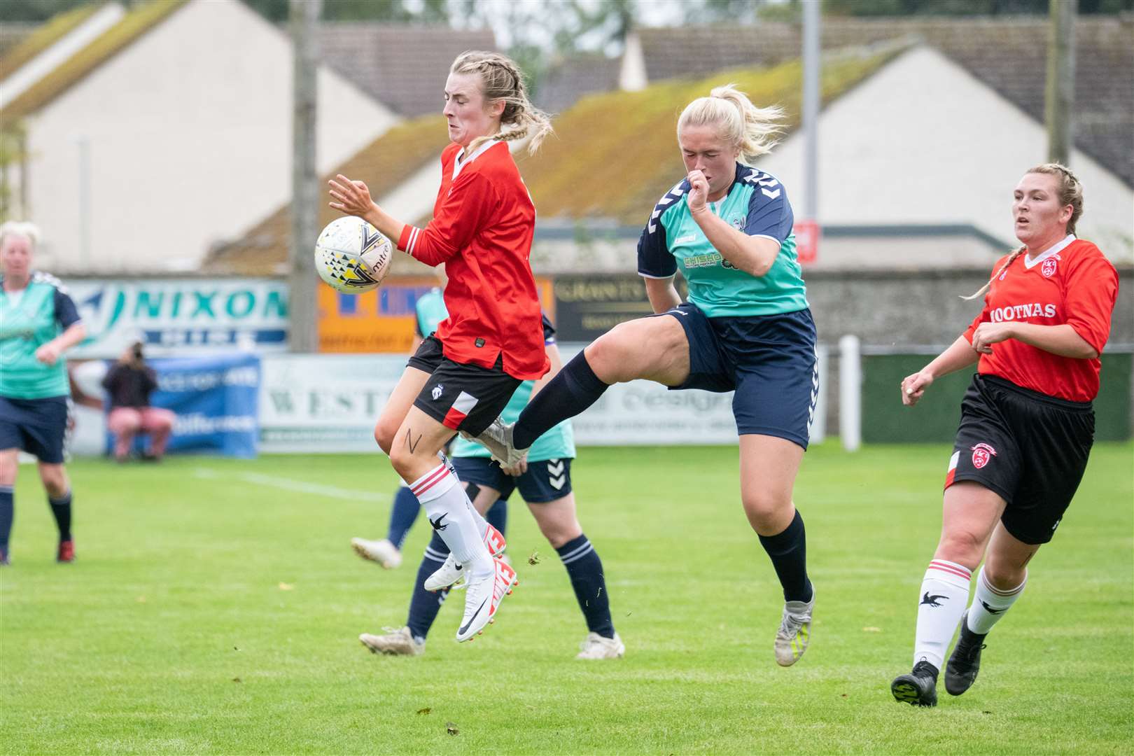 Bethin MacDonald leaps up to try and block this effort from Buckie's Emily McAuslan. Picture: Daniel Forsyth
