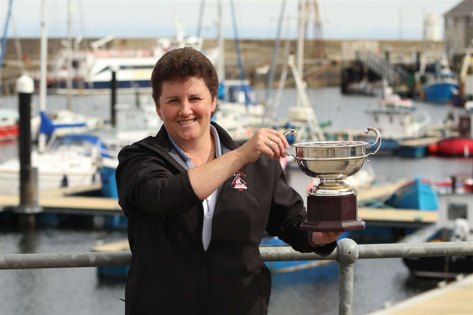 Deirdre Macangus shows her club championship trophy in Wick this week. Picture: Alan Hendry