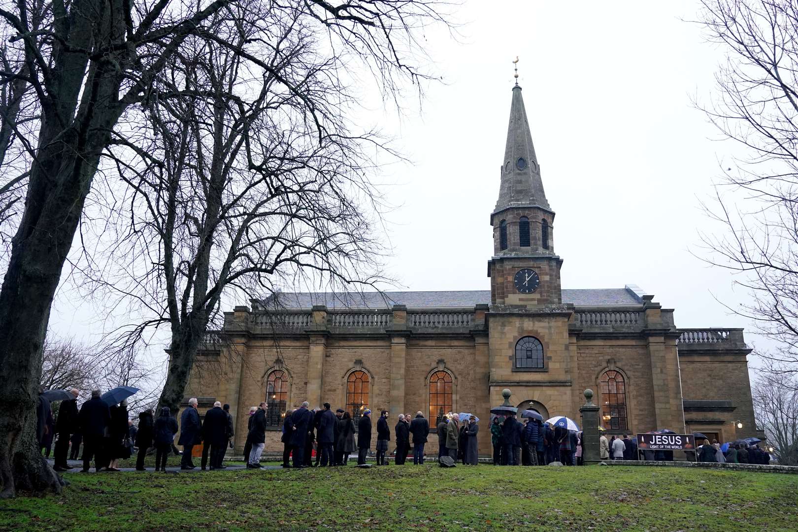 Guests outside Melrose Parish Church before a memorial service for Doddie Weir on Monday (Andrew Milligan/PA)
