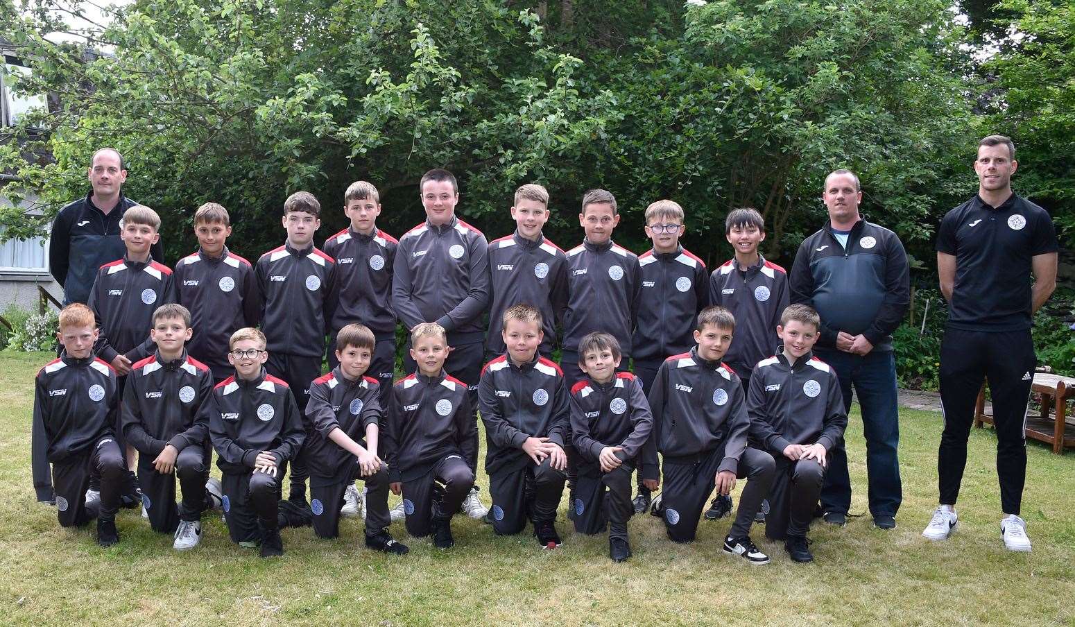 Caithness United under-12 players with their coaches. Picture: Mel Roger