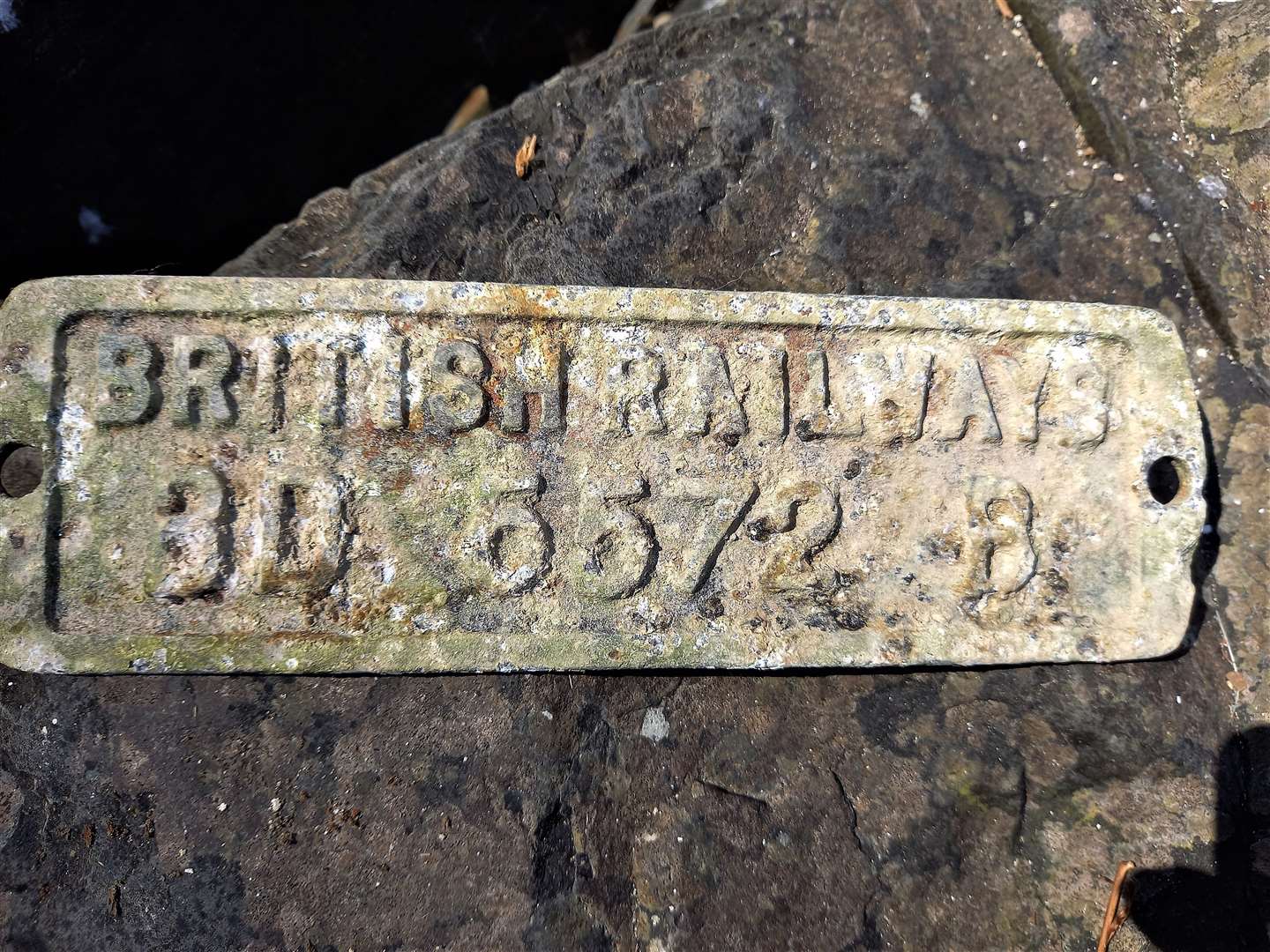The metal railway plate found at the bay close to Wick. It was wedged between boulders on the beach. Picture: David Shand