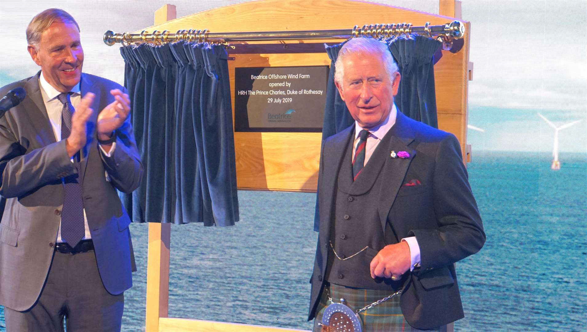 After a short speech Prince Charles unveiled a plaque to mark the official opening of the Beatrice offshore wind farm. Picture: DGS