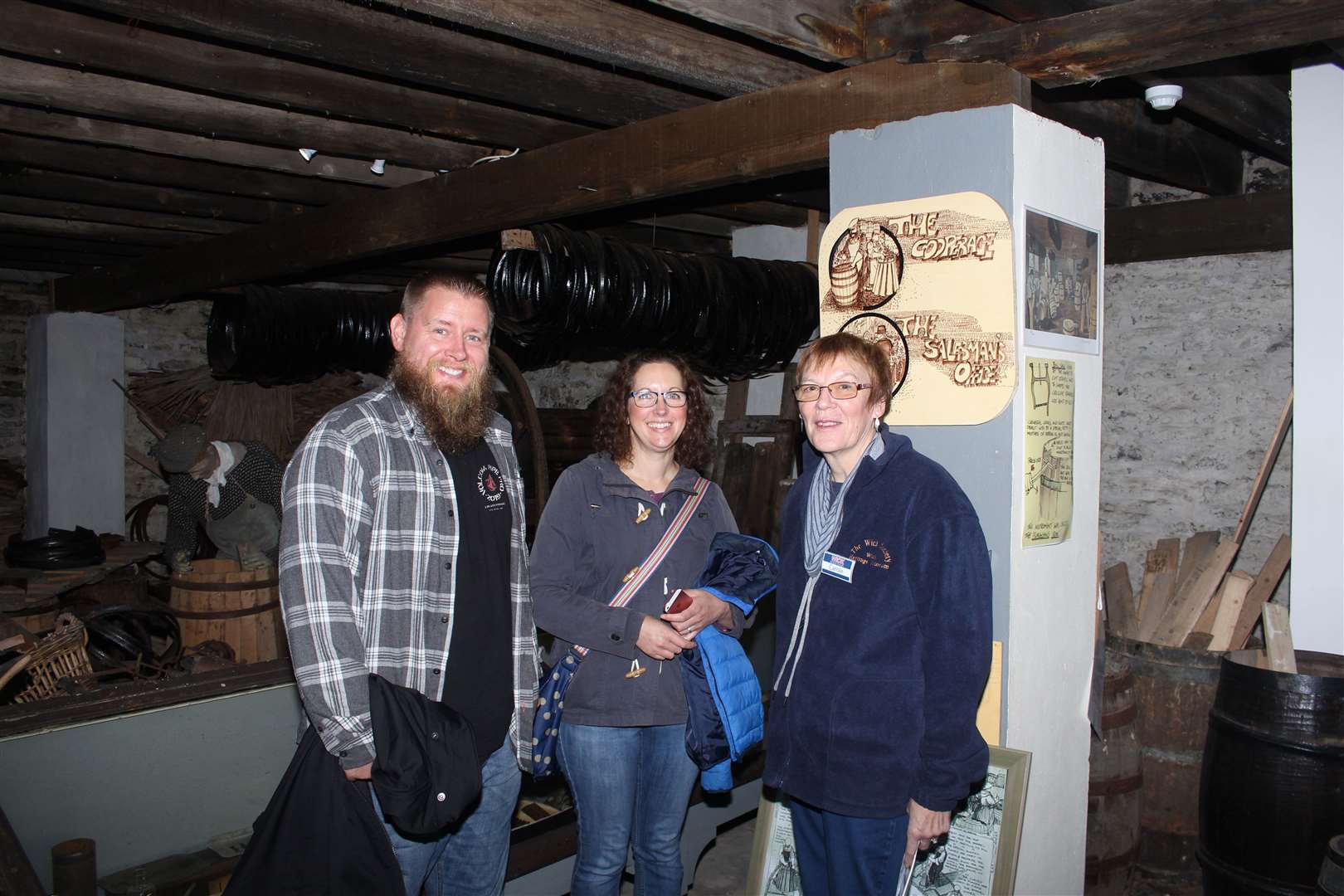 Volunteer Carole Sinclair showing visitors around the cooperage area during the museum's recent Doors Open Day event.