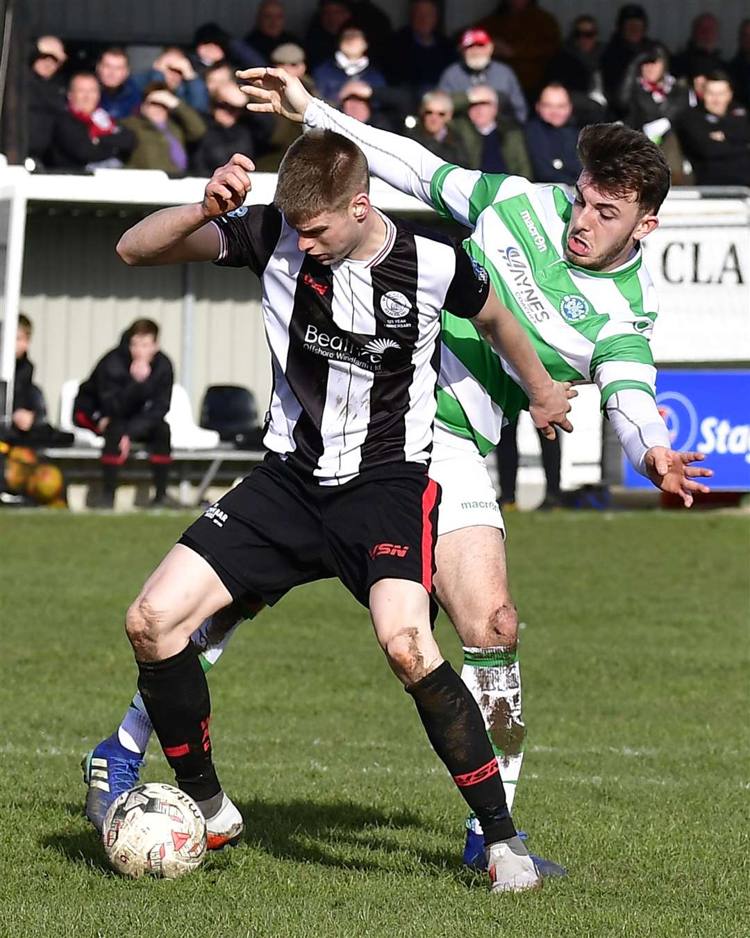 Wick's Marc Macgregor shields ball from Buckie's Sam Morrison at Harmsworth Park last Saturday. Macgregor scored both goals as Academy won 2-0 to extend their unbeaten run in the Highland League to eight matches. Picture: Mel Roger