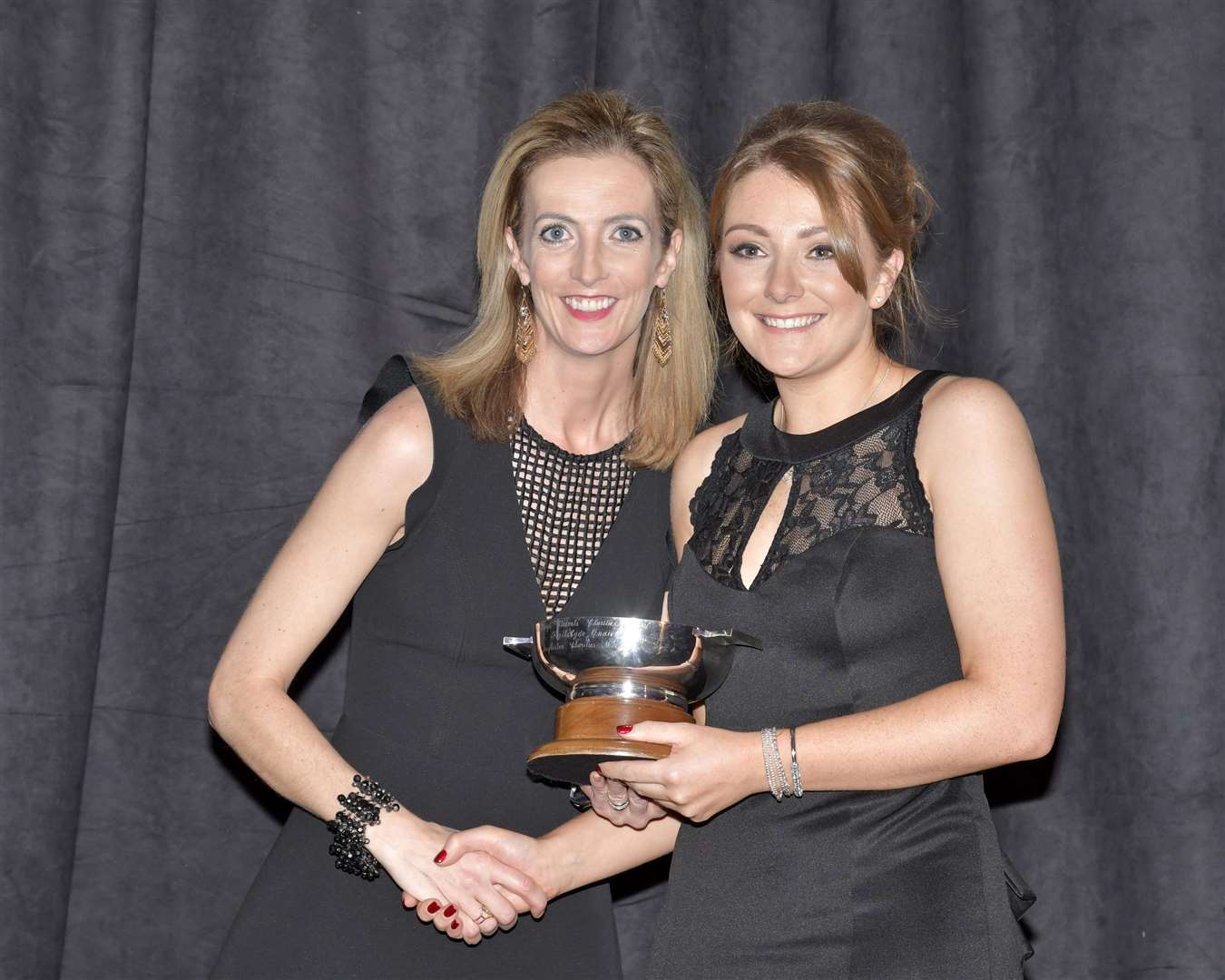 Ashleigh (right) receives the Scottish Lady Driver of the Year award from Jillian Shedden. Photo: Jim Moir