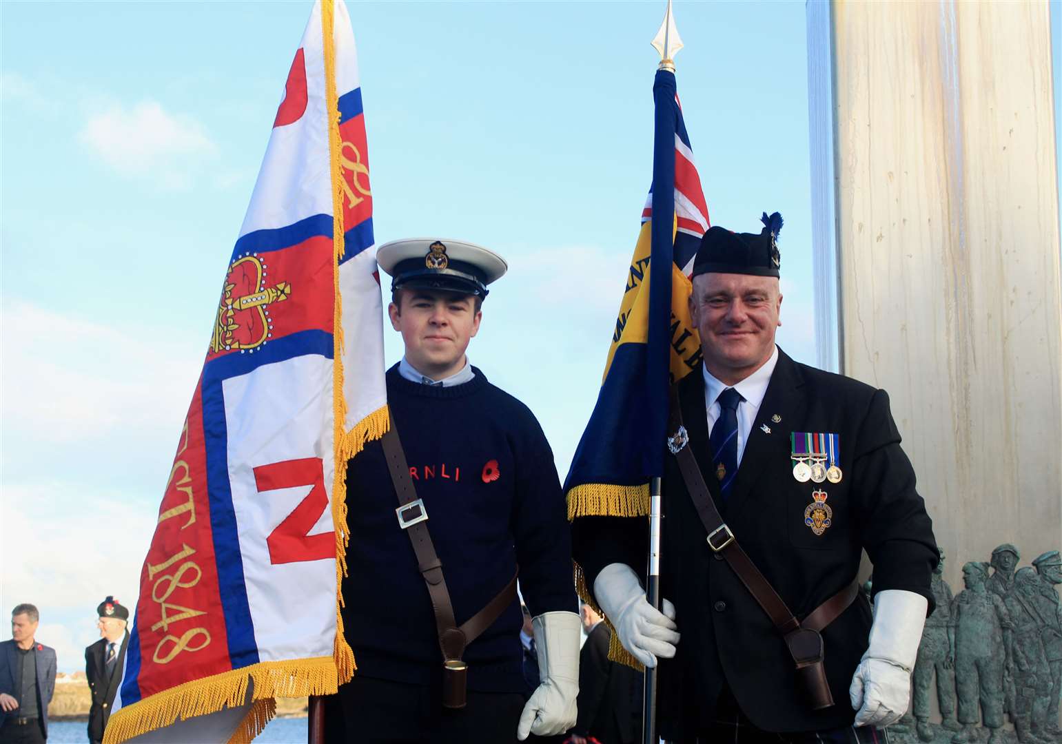 Jack Cormack (left) from the Wick RNLI crew and Kev Stewart, flag-bearer for the Wick, Canisbay and Latheron branch of Legion Scotland. Picture: Alan Hendry