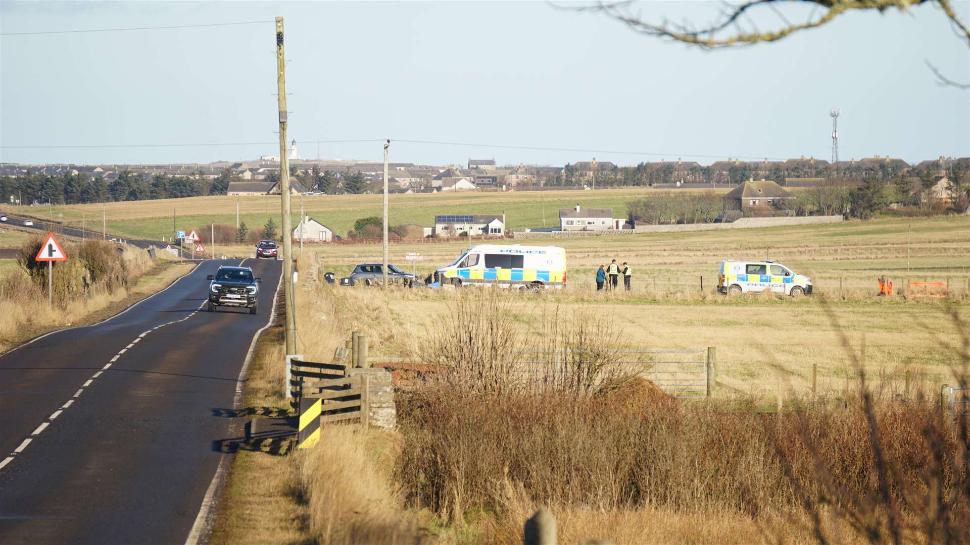 Police activity around the Barns of Hempriggs farm just south of Wick. Picture: DGS