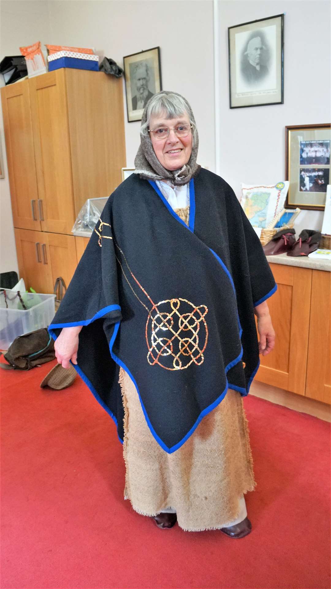 Jane shows the medieval pilgrim outfit she had created for the special occasion. Picture: DGS