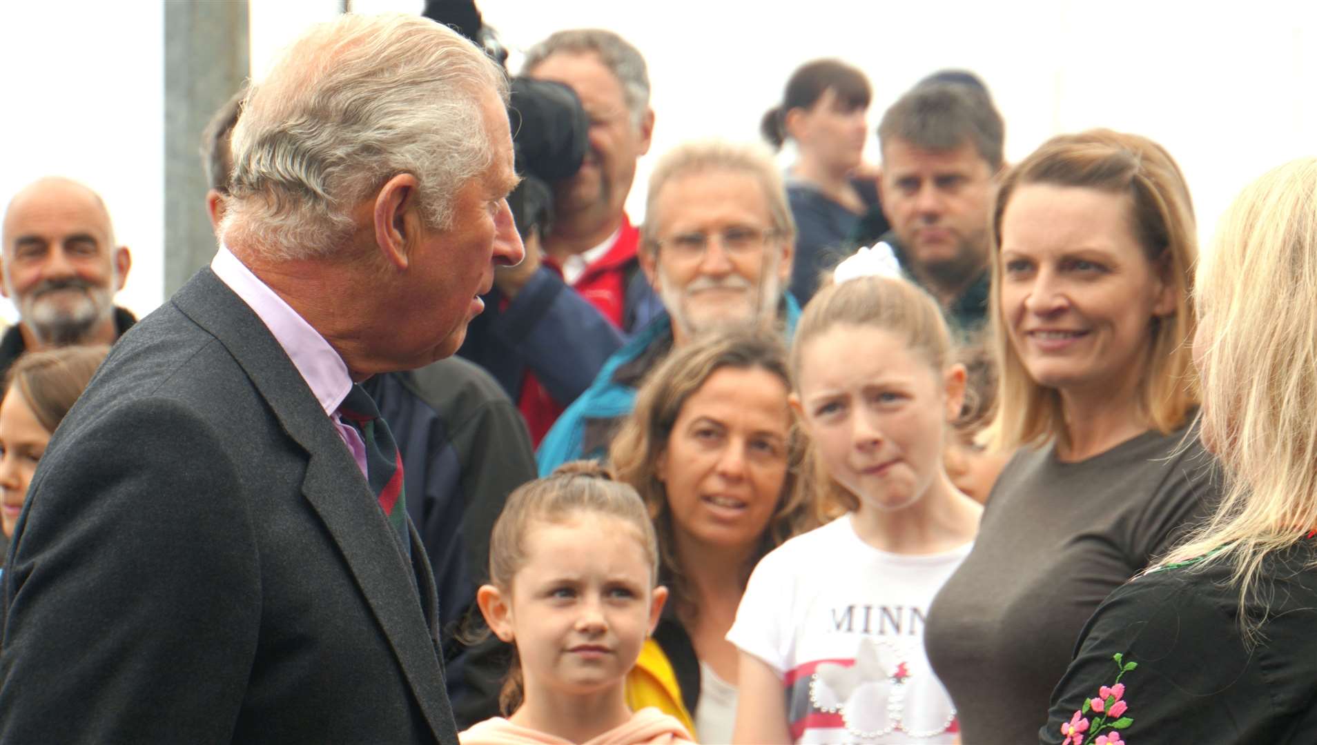 Prince Charles spoke to some of the local people who had gathered outside the Bowl offices on Harbour Quay on Monday morning. Picture: DGS