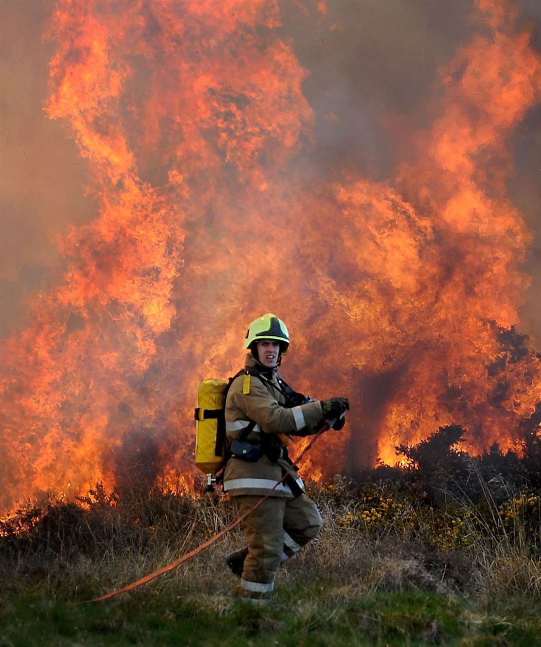 A firefighter tackling a Highland wildfire. Picture: Gary Anthony.