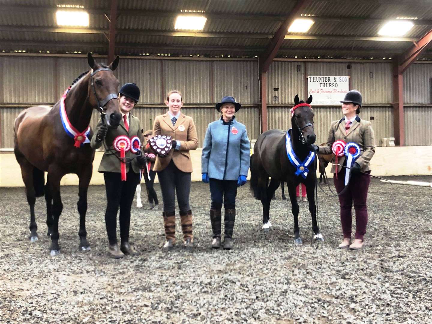 Overall winner of the in-hand section at the local BHS show Morven Mackenzie, with Atlantic Tiffany, is presented with her trophy by Orkney judge Vicki Cursiter, while fellow judge Toots Cromarty looks on along with the reserve winner Shanrye Finley and Lisa Kennedy.