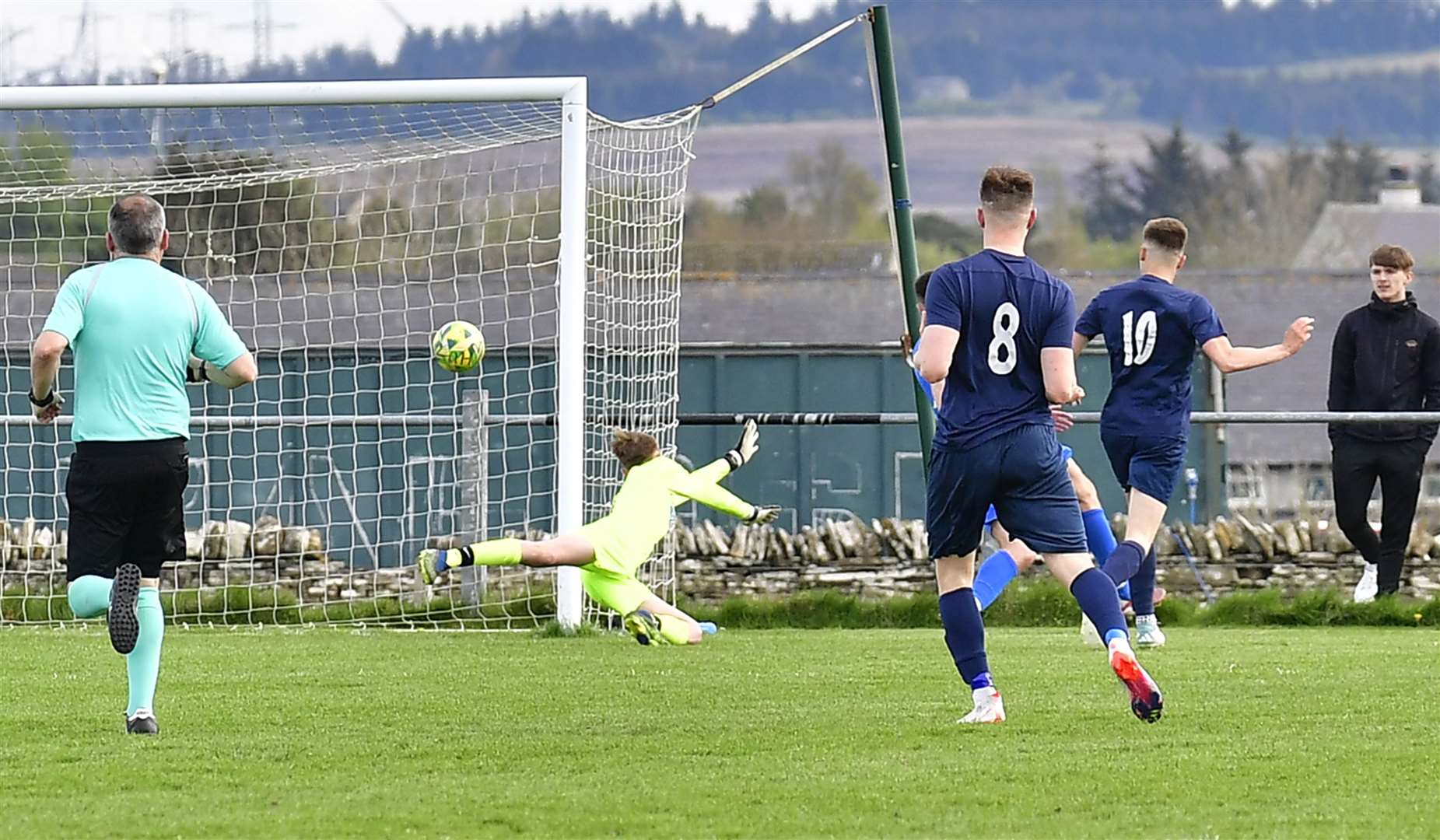 James Mackintosh (number 10) fires the ball past Acks keeper Mackenzie Beaton to put High Ormlie Hotspur 2-1 up at Morrison Park. Picture: Bob Roger