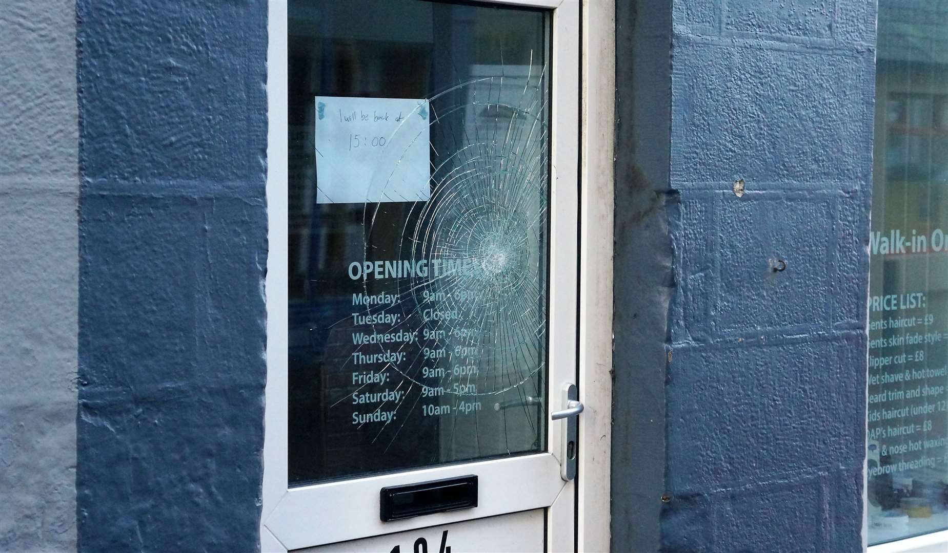 The Turkish barber's shop on Wick High Street had the door glass broken. Pictures: DGS