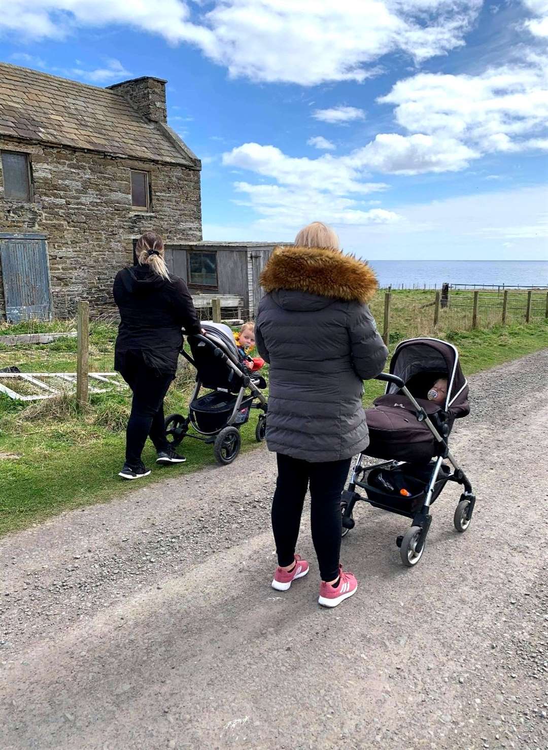 Some of the participants in the Wick mums' group out enjoying a walk along the coast at the weekend.