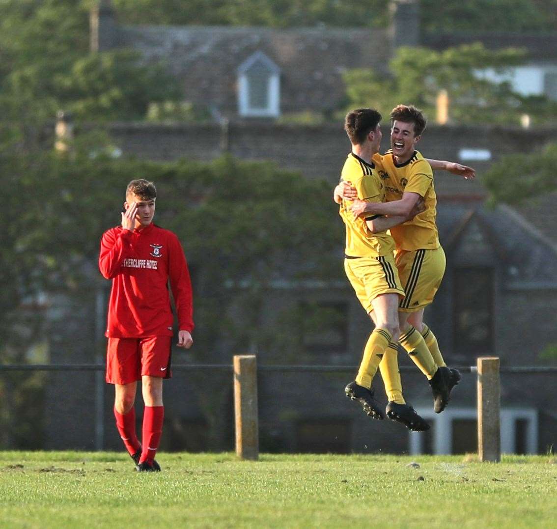 Kyle Henderson (left) congratulates Grant Aitkenhead on scoring Staxigoe's equaliser that earned them a 2-2 draw against Wick Groats. There was more for them to celebrate as Staxigoe received word they had been re-instated back into the Highland Amateur Cup after Bellmac were kicked out for fielding an ineligible player. Picture: James Gunn