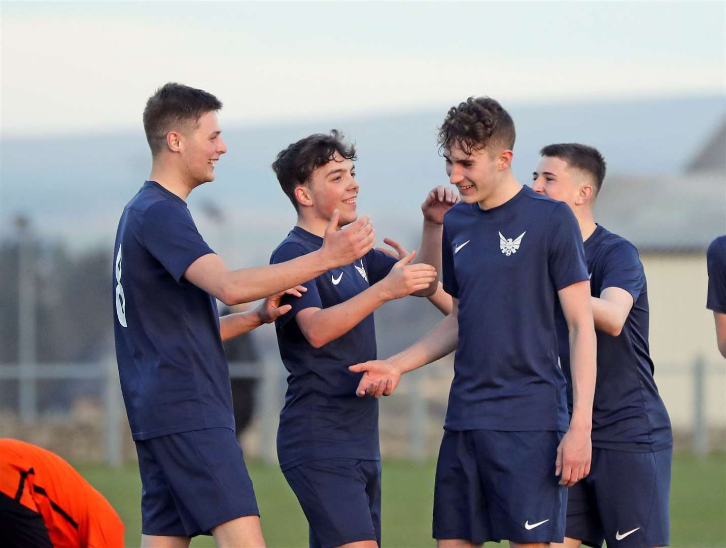 Stuart Campbell is congratulated by James Mackintosh and William Cannop after scoring the only goal for High Ormlie Hotspur against John O'Groats in CAFA Division One on Monday night. Picture: James Gunn