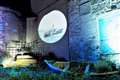 One of the films being shown on a wall at Wick's World War II memorial garden. Picture: Alan Hendry