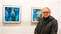 Don Clarke with his mixed media on panel works at the Winter exhibition in Thurso. Picture: DGS