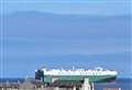 Vehicle carrier ship Traviata looms large in Thurso Bay