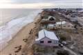 Four coastal homes may be demolished after road collapse