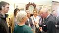 Prince Charles talks to journalists after the night's stay.