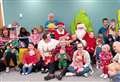 Children meet Santa and Mrs Claus at Bookbug session in Wick