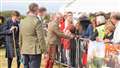 The King met some of the visitors to the event but curtailed his walkabout through the trade stands. Picture: DGS