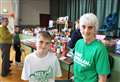 Packed village hall in Watten for Macmillan coffee morning event 