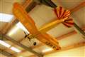 A model aircraft hanging from the ceiling.