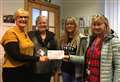 Dress-down donation for Caithness sight and hearing group